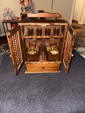Vintage Wooden Home Bar Cabinet with Amber Glass Decanters